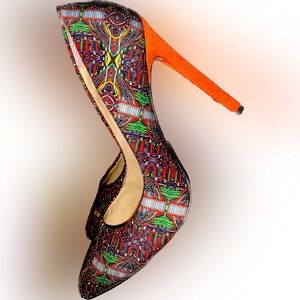 Gx by Gwen Stefani pumps, size 9. Orange Tribal Canvas